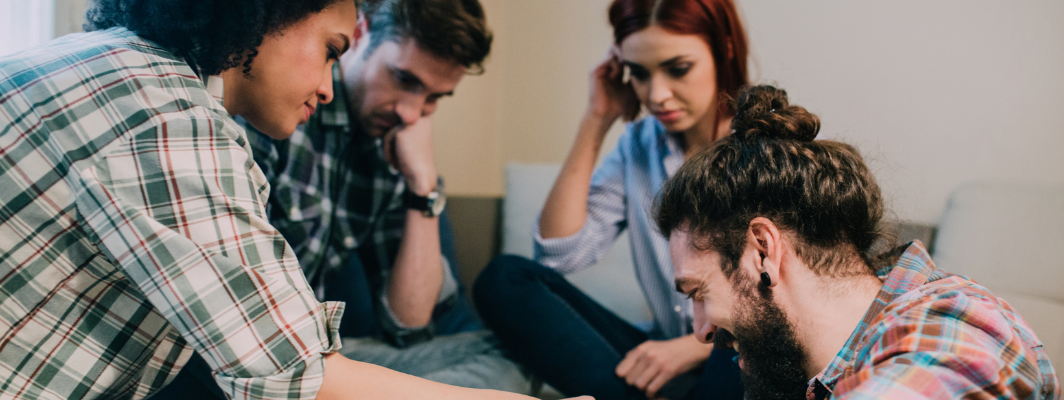a group of friends playing a board game together